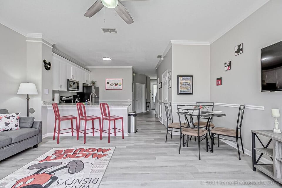 Seamless open-concept space combining kitchen, dining, and living areas for effortless living.