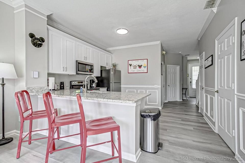 Enjoy the convenience of an open kitchen with a spacious counter table, perfect for cooking, dining, or gathering with family and friends.