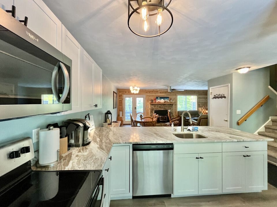 Granite countertops and full size stainless steel appliances