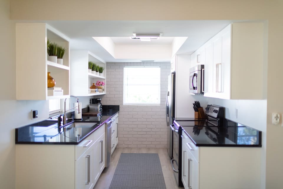 Galley Kitchen Located Right off Dining Room