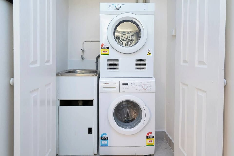 The apartment has internal laundry facilities including a washer and dryer that are free for guests to use during their stay.