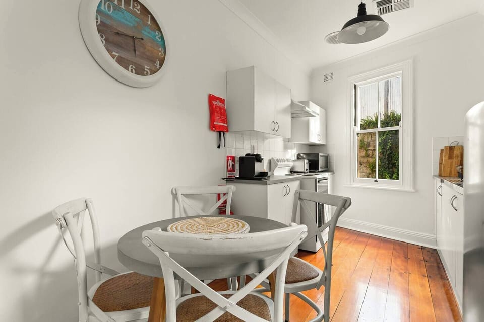 Dine indoors with the convenience of a four-seater table right by the kitchen.