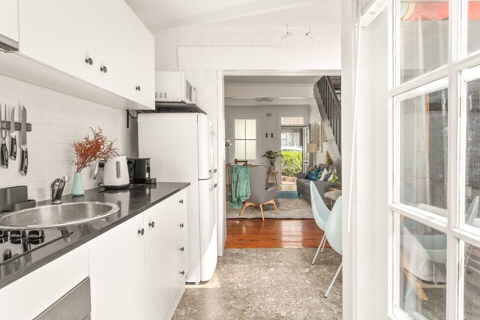The kitchen is fully equipped for your holiday catering with sleek appliances and cooking utensils.
