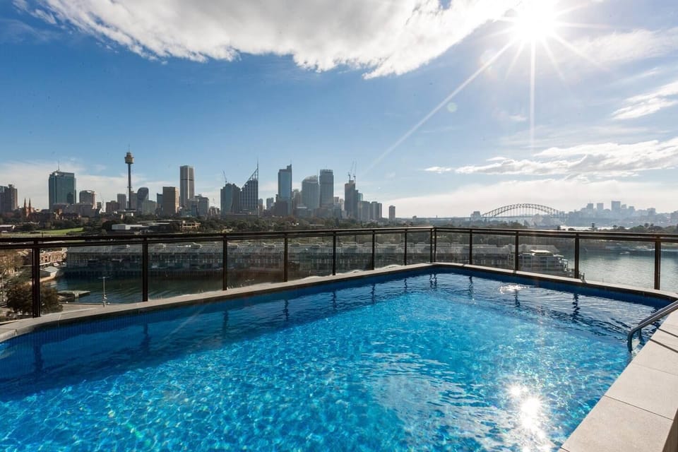 Enjoy scenic views while you laze around by the shared rooftop pool.