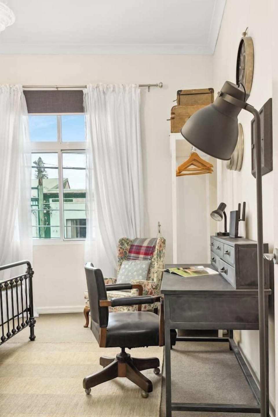 Located in the first bedroom, this workspace includes ergonomic seating to enhance focus and ease.