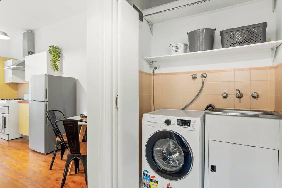 There are concealed laundry facilities for use during your stay, including a washer-dryer and a separate sink. 
