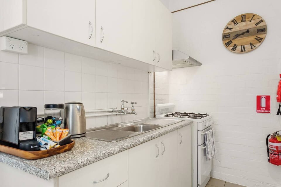 The kitchen features all the basics you need to cook meals at home with the added bonus of a coffee machine. 
