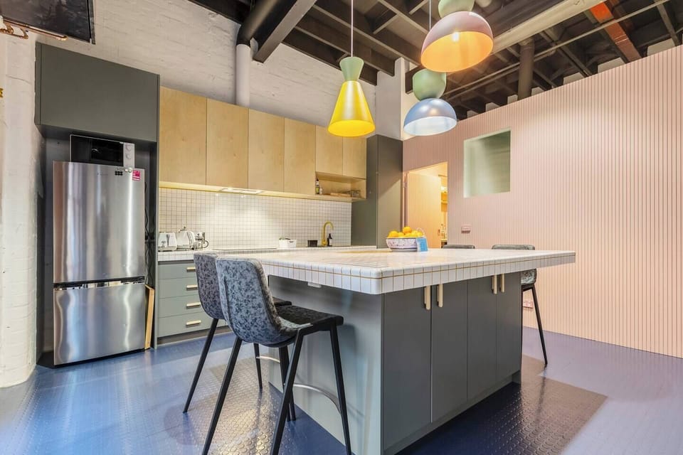Cook meals in the colourful kitchen fitted with all the essentials, including a dishwasher for easy clean up. 