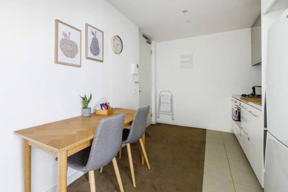 Guests can enjoy meals at home at the cosy two-seater table where you can also set up a laptop for work
