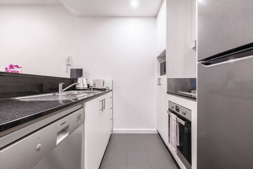 When you’re not cafe-hopping on nearby Bay Street, the modern, streamlined kitchen has all you need to prepare meals at home. 
