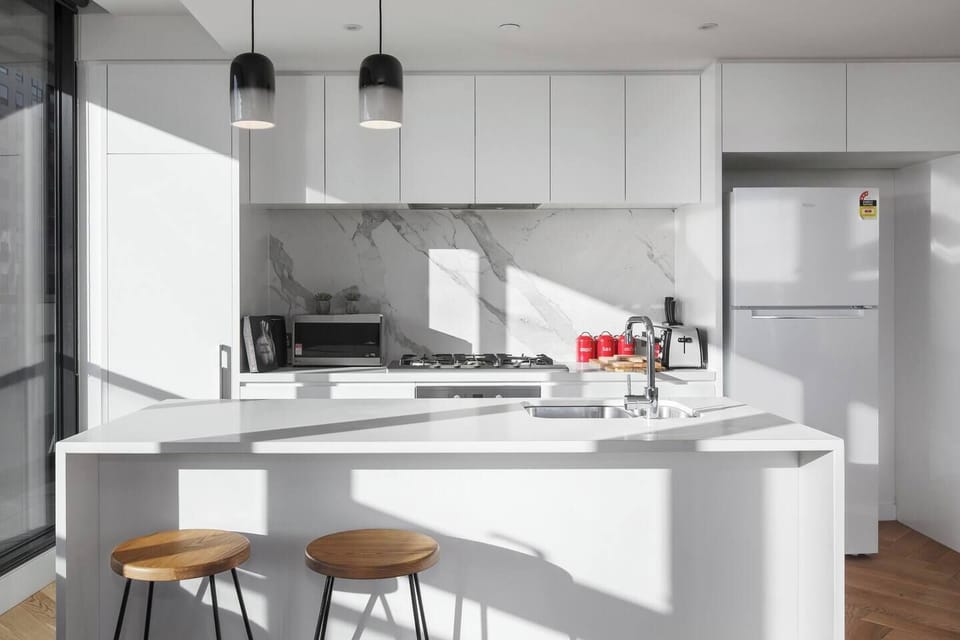 Grab a bite at the island before a long day or use the fully-equipped modern kitchen to make a great home-cooked meal.