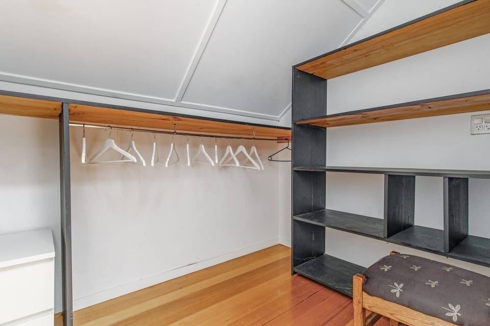 A spacious walk-in closet offers plenty of storage for your clothing, luggage and other belongings.