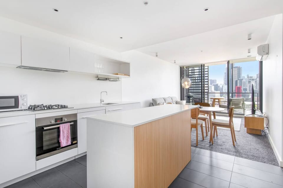  The modern, streamlined kitchen has everything you need to prepare meals at home, including a dishwasher for easy clean-up.  