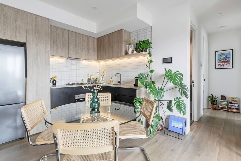 Enjoy meals at home around the central dining table or discover countless eateries close 
