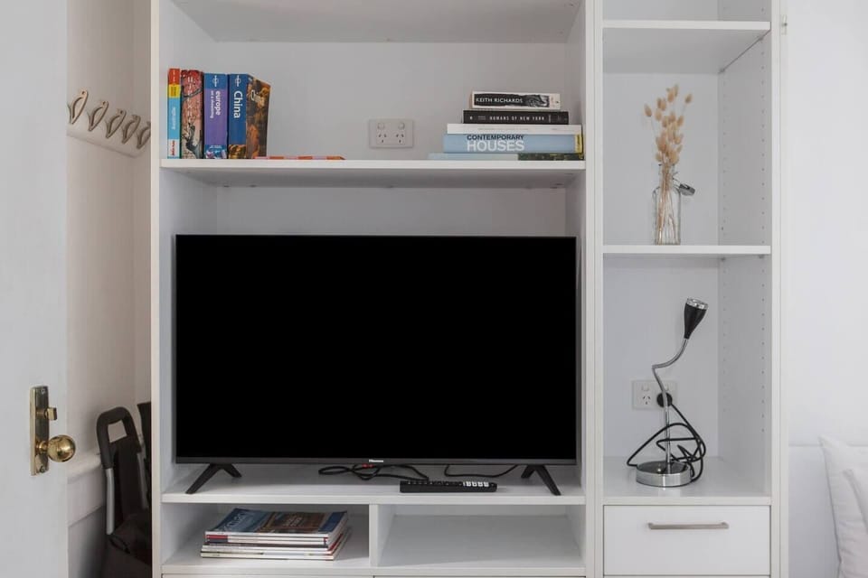Get lost in a good movie or TV show, the perfect spot for a quiet night in.
