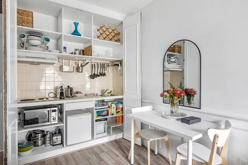 The well-equipped kitchen has everything you need to take a break from eating out and can be completely hidden away with bifold doors 
