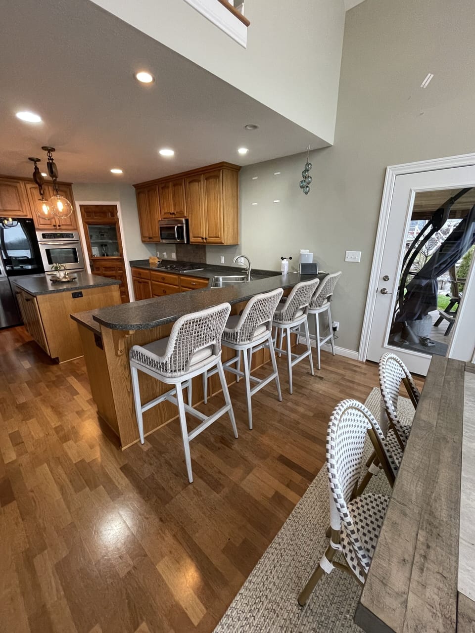 Dining Area - seats 8 people at the table and 4 people at the bar. 
