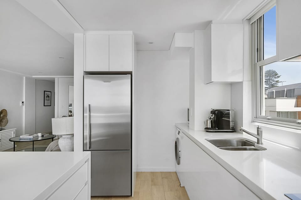 Full size fridge and laundry alcove