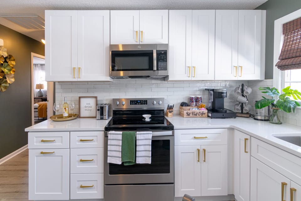Fully-equipped kitchen with complete sets of cookware