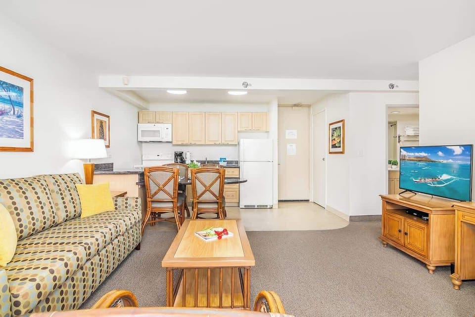 Watch your favorite TV shows in the living room with a pull-out sleeper sofa.