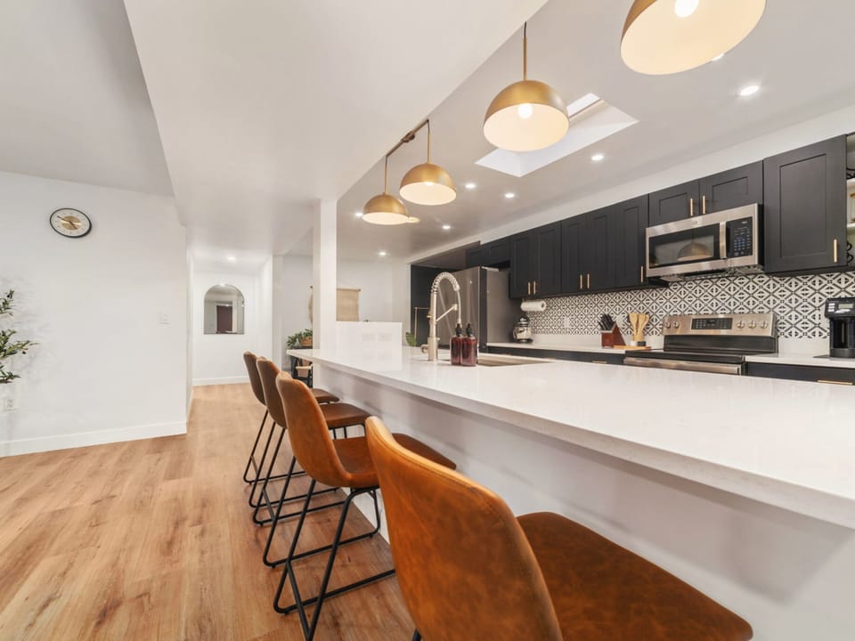 Cook, gather, and savor in a modern kitchen designed for memorable meals.