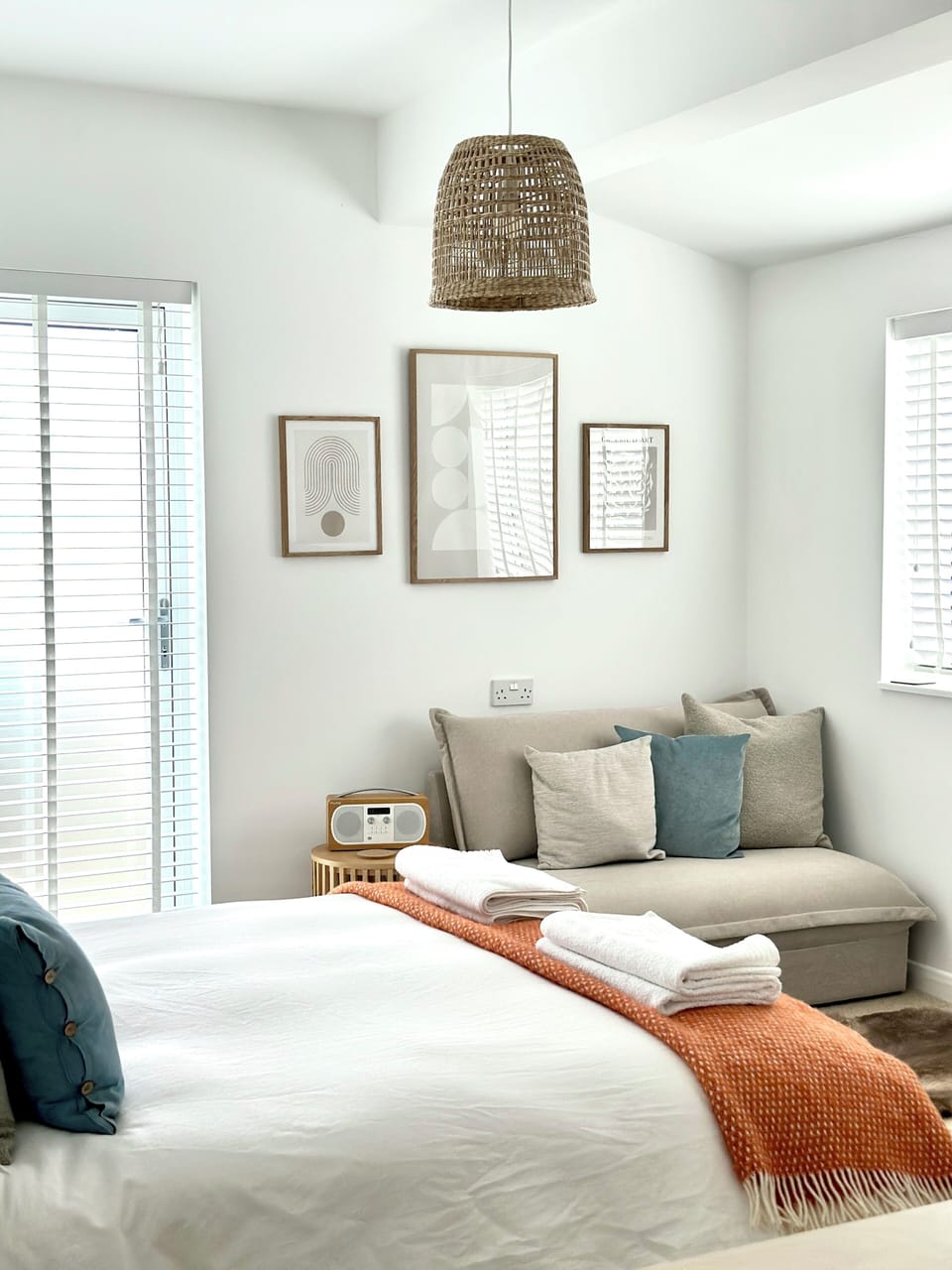 Kingsize bed with double sofa bed in background