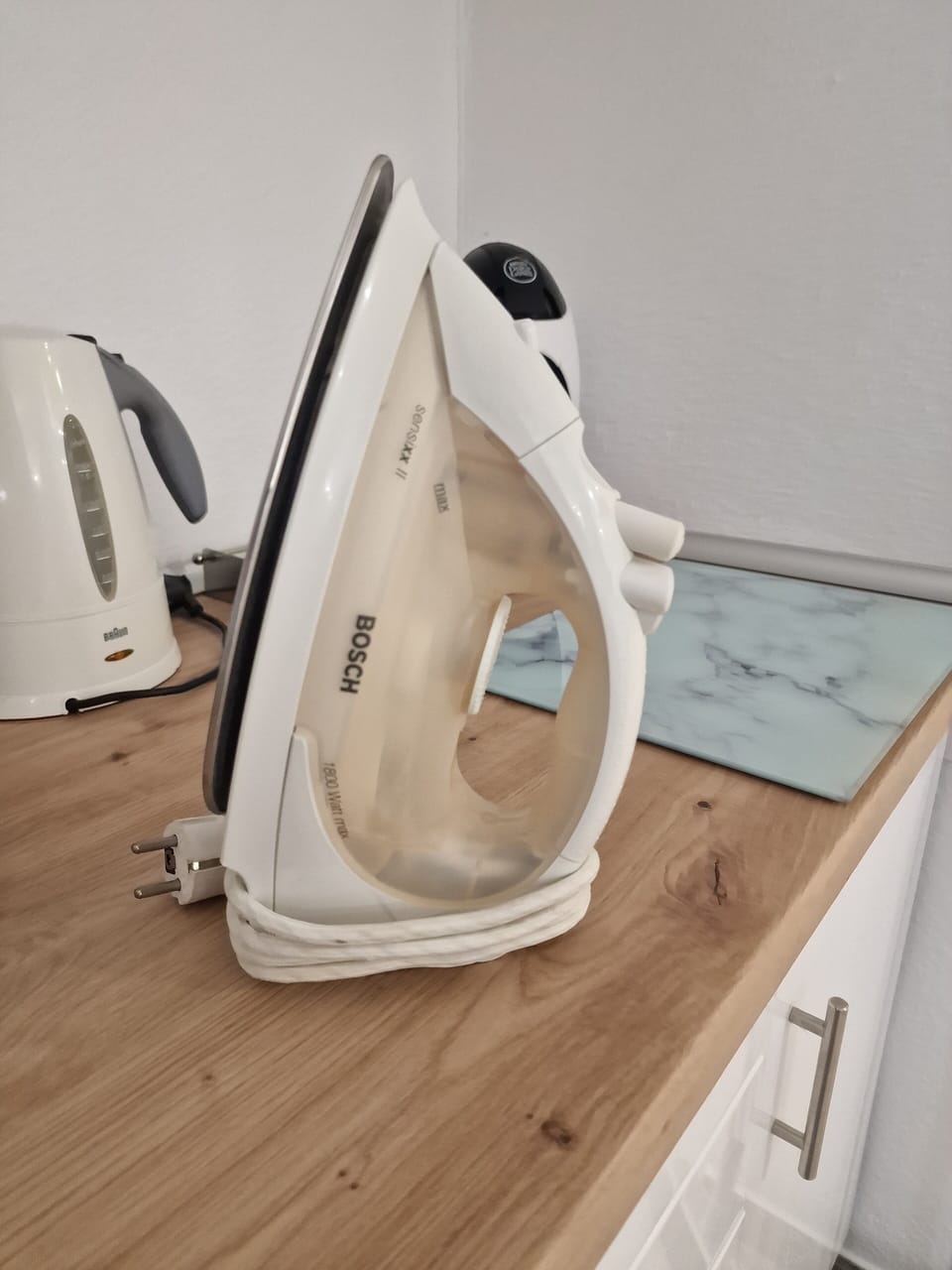 Iron & Ironing Board provided