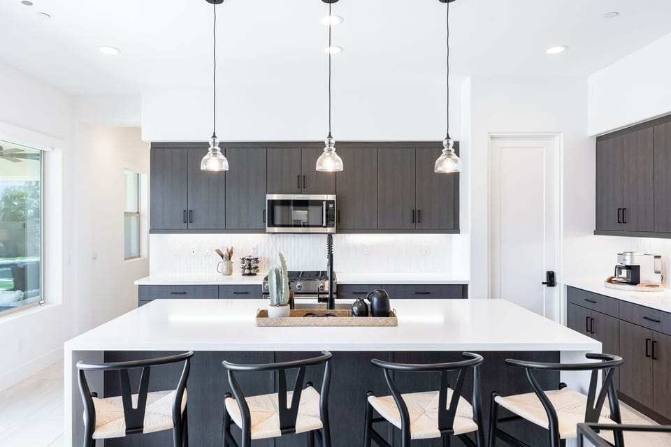 Bar-height seating for four is available on the kitchen island.