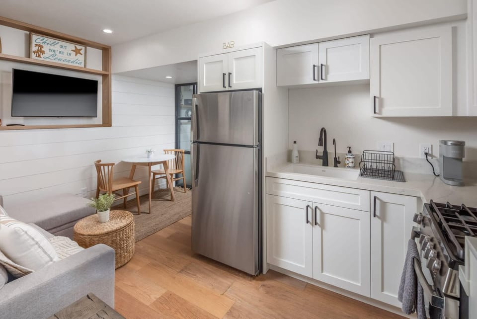 The kitchen is fully equipped with all cooking essentials.
