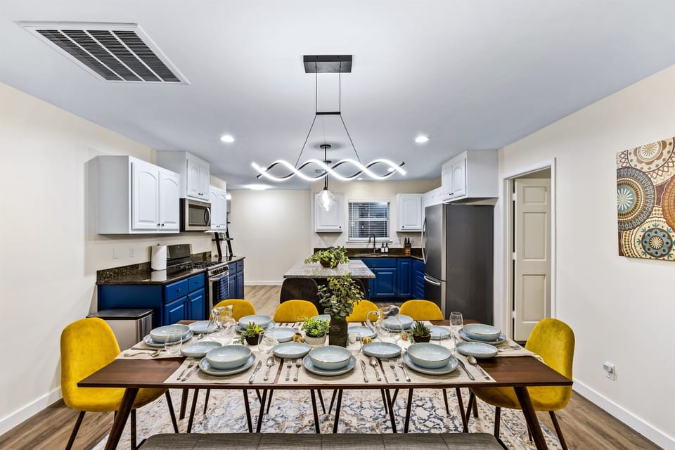 Extra large dining table plus plenty of chairs (2 more chairs not shown here available to be added to the table)