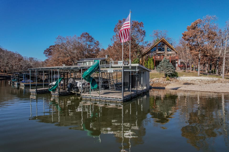 Dock, upper swim deck, 2 slides and 2 swings.