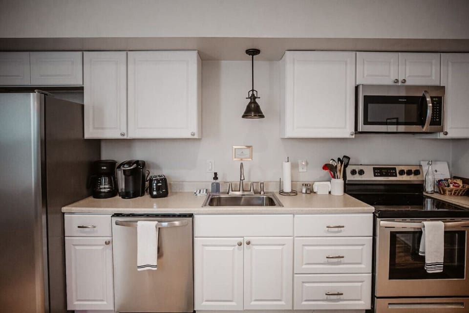 Fully stocked kitchen with dining space for 8.