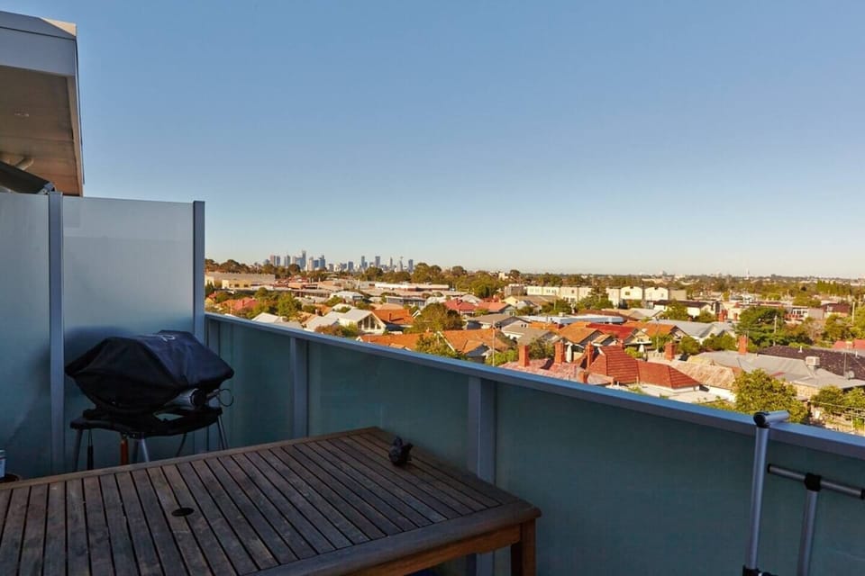 Enjoy your morning coffee on the balcony. It has a BBQ with a large outdoor table.