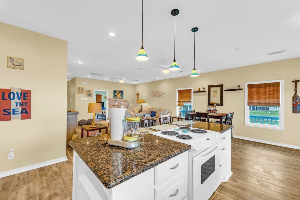 Open-concept living and kitchen space, designed for laid-back coastal comfort.