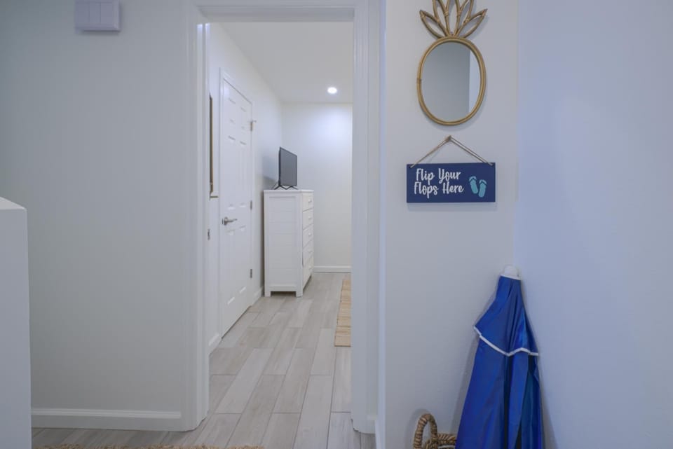 Entry to first bedroom and full attached bath.