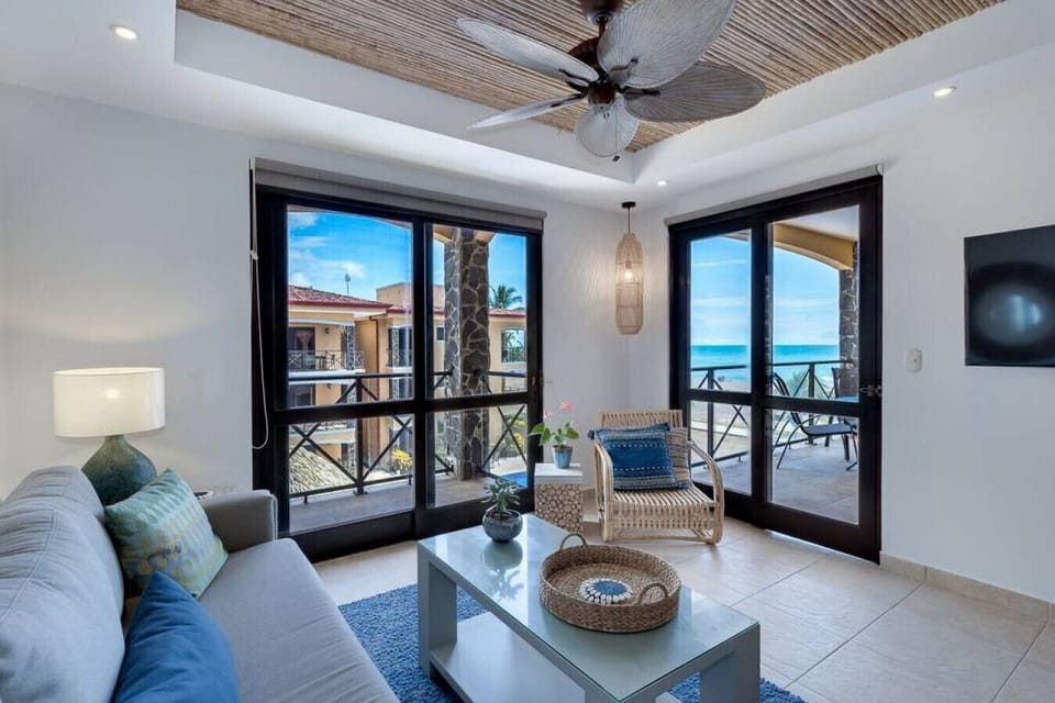 Our Living Room, recently updated with Bamboo ceiling inlays, ceiling fan and Smart TV.  And, of course, more views.