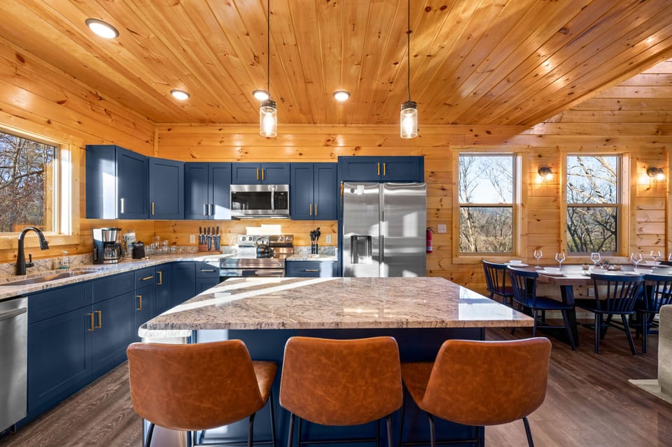 Hang out in the kitchen and snack on this beautiful granite countertop! 