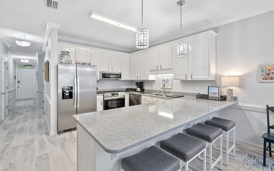 updated lighting, countertops, appliances, flooring