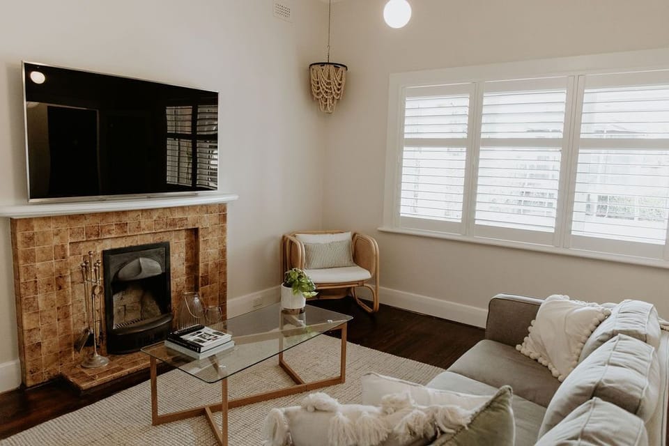 Front lounge room with open fireplace