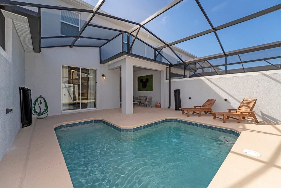 Enjoy your own private pool and BBQ area with outdoor seating—ideal for relaxing after a day at the parks.