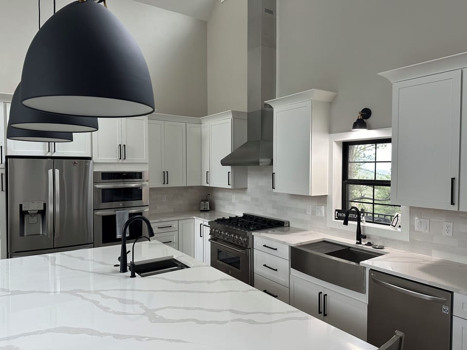 Chef's kitchen with 2 sinks and HUGE island
