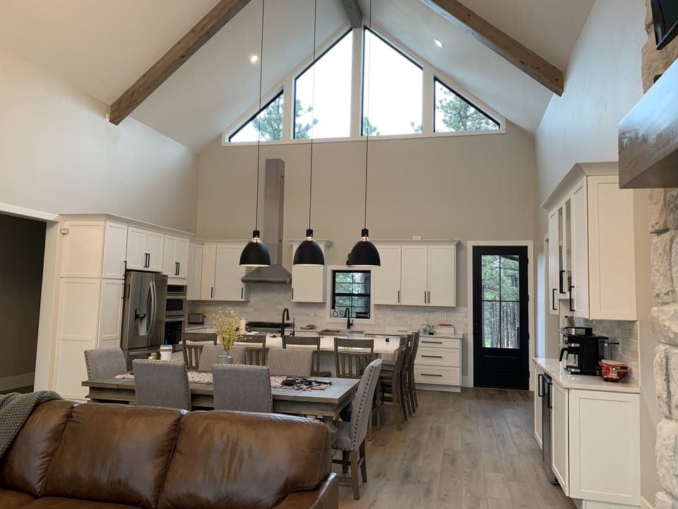 Open floor plan with lots of space for gathering.  Large dining room table 