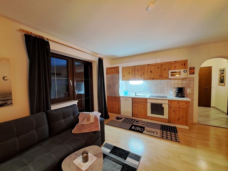 Property, Furniture, Couch, Interior Design, Living Room, Table, Wood, Floor, Flooring, Wall