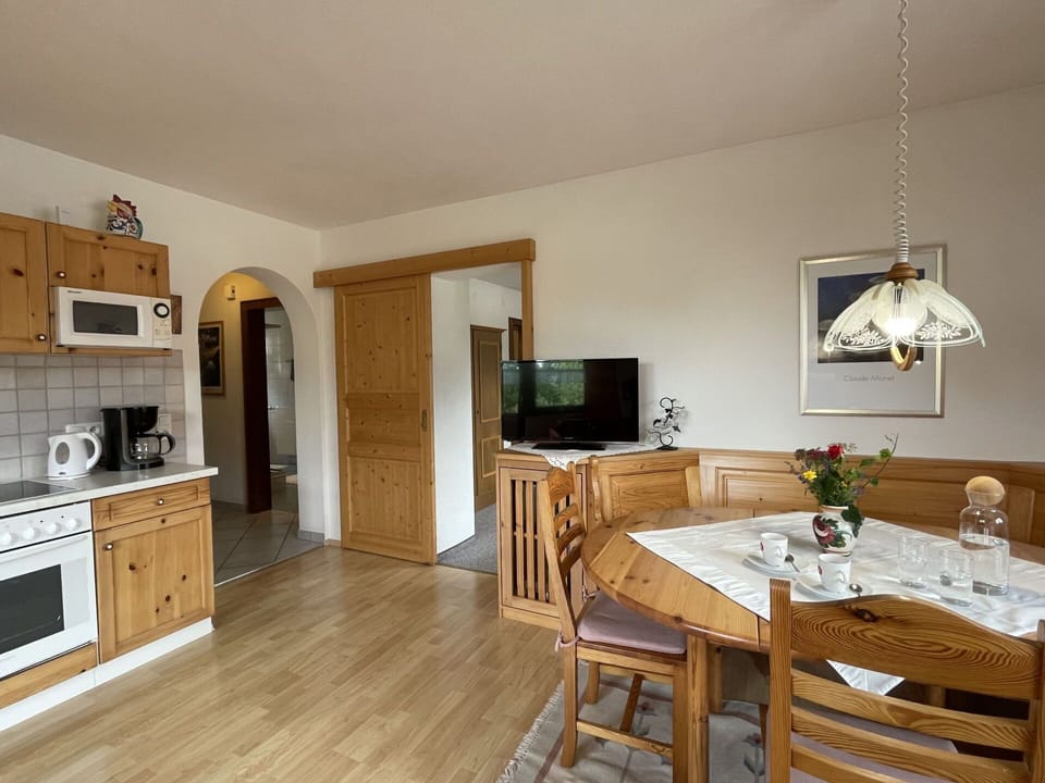 Furniture, Cabinetry, Table, Wood, Home Appliance, Living Room, Flooring, Interior Design, Floor, Laminate Flooring