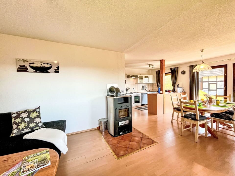 Flooring, Furniture, Wood, Floor, Interior Design, Ceiling, Room, Wood Flooring, Chair, Living Room