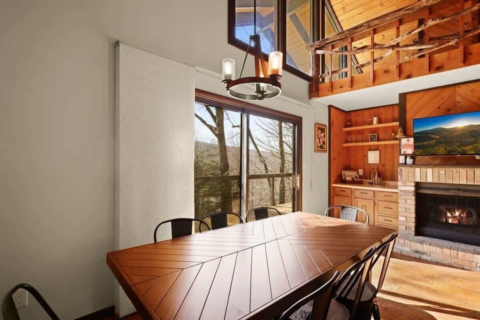 Experience the joy of home-cooked meals in our inviting dining area, just steps away from the kitchen. Gather around the wooden table that welcomes up to 8 guests – because good food is best enjoyed with great company!