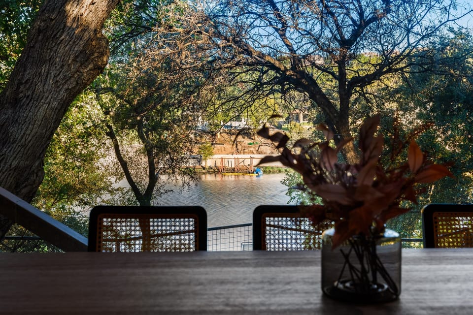 Enjoy the calming embrace of Lake Austin amid lush green surroundings at our vacation home