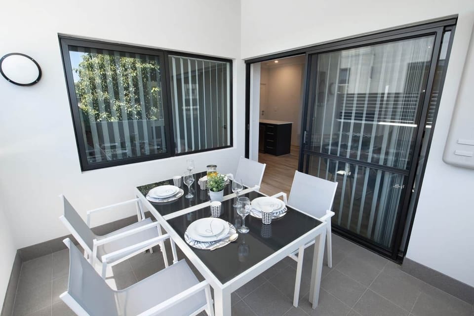 Charming outdoor space just off the living area—ideal for relaxed dining or drinks.