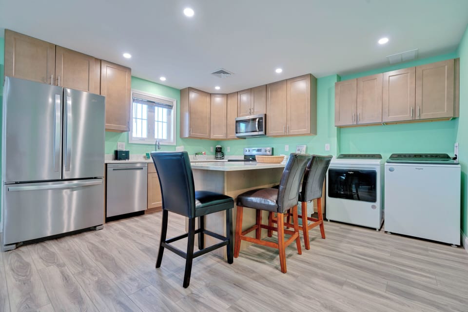 Unit A kitchen / dining room area 
private washer and dryer 
