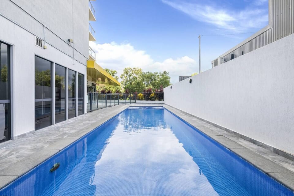 Cool down and stay active in the residents' outdoor lap pool.